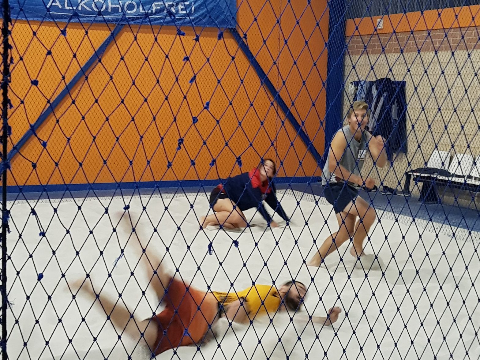 player diving to save point during volleyball gameBunbury Indoor Beach